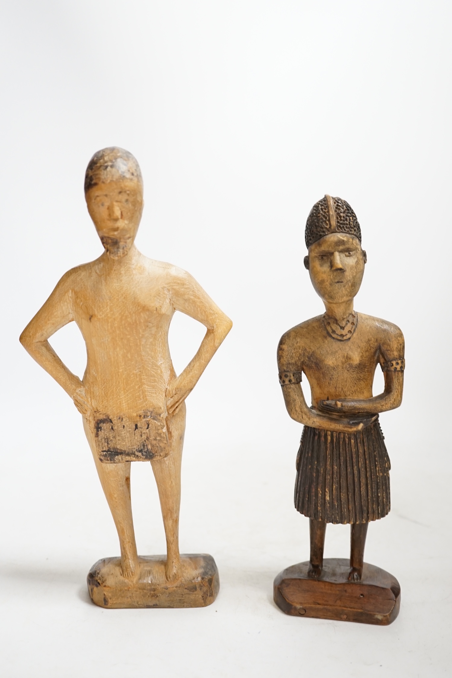 Two African carved wood figures, Akan people and probably Fanti, tallest 27cm. Condition - fair to good